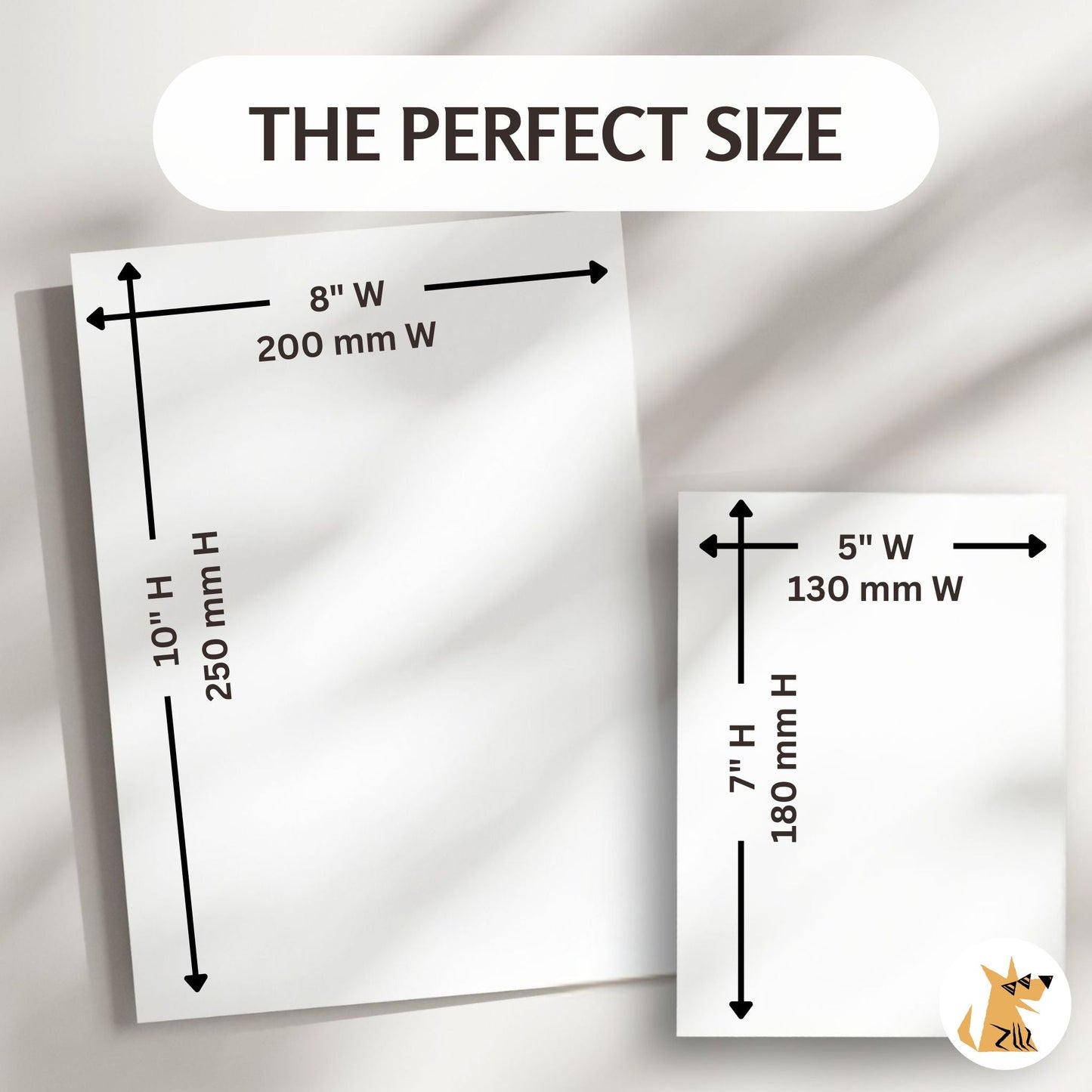 Two pieces of paper with measurements labeled on a light gray background